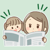 新聞を読む親子