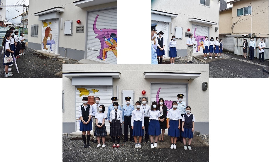 桃陵中学校の生徒と新しく完成したシャッターアート